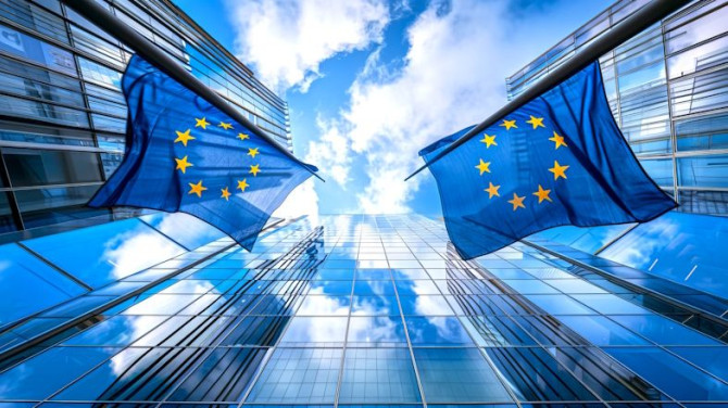 european-union-flags-reflected-modern-glass-buildings-against-blue-sky-captures-spirit-unity-european-identity-ideal-corporate-governance-eurelated-content-ai.jpg