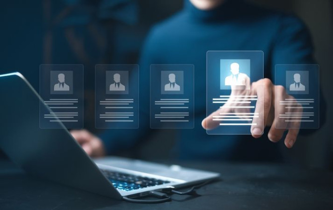 hr-human-resources-management-concept-headhunters-recruit-employees-by-candidate-resumes.jpg