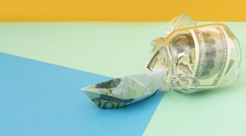 financial-freedom-still-life-arrangement-with-copy-space.jpg