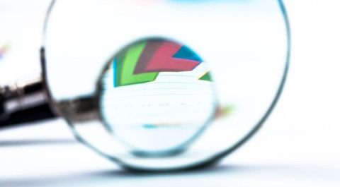 two-magnifying-glasses-document-with-graph-close-up.jpg